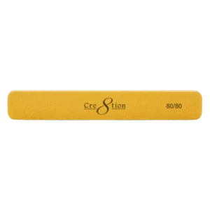 Alternative view of Cover more surface with every pass. The Cre8tion Jumbo Gold file runs a premium sandpaper grit over a soft compression core, so it shapes fast and stays comfortable through back-to-back appointments.  Why techs love it  80/80 grit for shaping acrylic, hard gel, and natural nails Jumbo length covers more nail per stroke for quicker sets Superior cut saves filing time on heavy work Soft compression core absorbs shock and softens abrasiveness Grit: 80/80. Packaging: 50 pcs/pack, 30 packs/case.